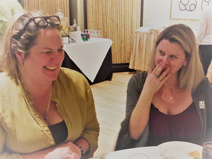 Amy and Sam cracking each other up at a private retreat in Los Angeles